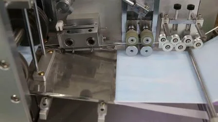 Mascarilla médica automática con máquina de alimentación de cajas de corbatas